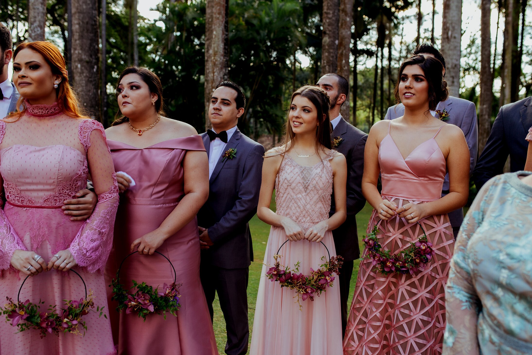 Emotional bridesmaid and wedding guests